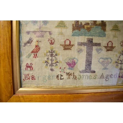 1446 - A 19th century needlework sampler, by 'Margaret Thomas, Aged 12 years', 41 x 32.5cm; together with a... 