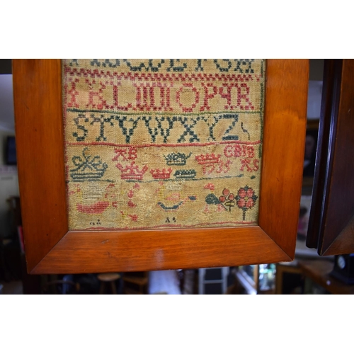 1448 - An 18th century alphabet sampler, dated 1735, 39 x 19cm.  