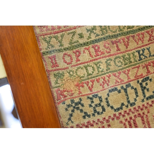 1448 - An 18th century alphabet sampler, dated 1735, 39 x 19cm.  