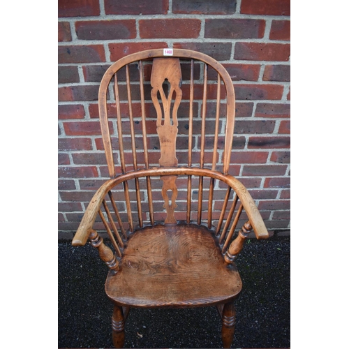 1468 - A Victorian ash, fruitwood and elm high back Windsor armchair. 