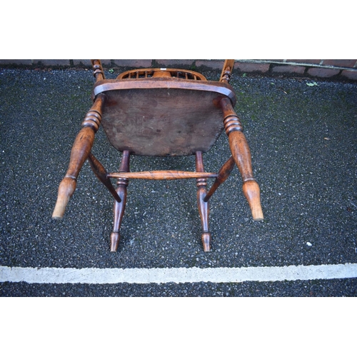 1468 - A Victorian ash, fruitwood and elm high back Windsor armchair. 