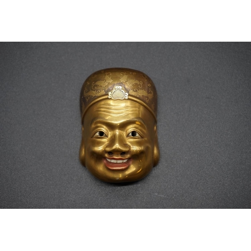 1242 - An extremely fine and unusual Japanese carved ivory, gilt lacquer and mother-of pearl Buddha mask ne... 