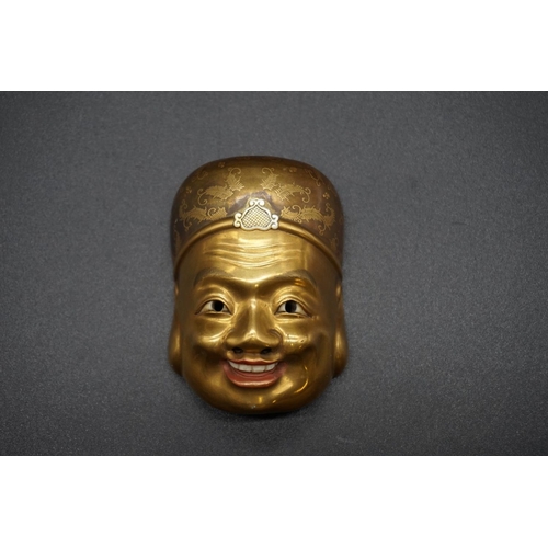 1242 - An extremely fine and unusual Japanese carved ivory, gilt lacquer and mother-of pearl Buddha mask ne... 