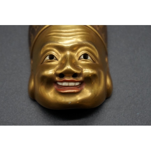 1242 - An extremely fine and unusual Japanese carved ivory, gilt lacquer and mother-of pearl Buddha mask ne... 