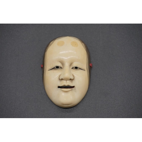 1245 - A good Japanese carved ivory Noh mask okimono of Fukai, Edo, signed, 7.2cm.