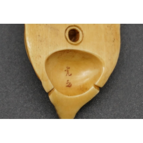 1266 - A good Japanese carved ivory 'Jyo-kei' Noh mask netsuke, Meiji, signed, 4cm.