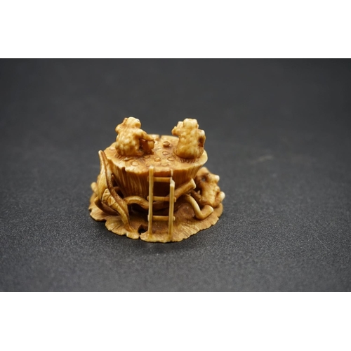 1273 - A carved Japanese ivory netsuke, by Gyokuzan, Edo, depicting toads on a lily pad, signed, 3.6cm wide... 