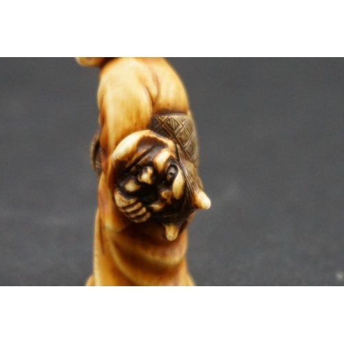 1278 - A good Japanese carved ivory netsuke, Meiji, depicting an elderly lady with a Noh mask and stick, 4.... 