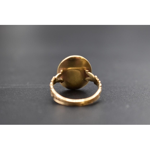 202 - An interesting antique yellow metal and carnelian intaglio ring, the intaglio possibly Roman, finely... 