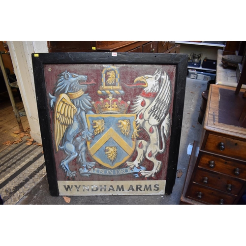 1240 - An old double sided 'Wyndham Arms' public house sign, 107 x 99cm. The Wyndham is located in Dinton, ... 