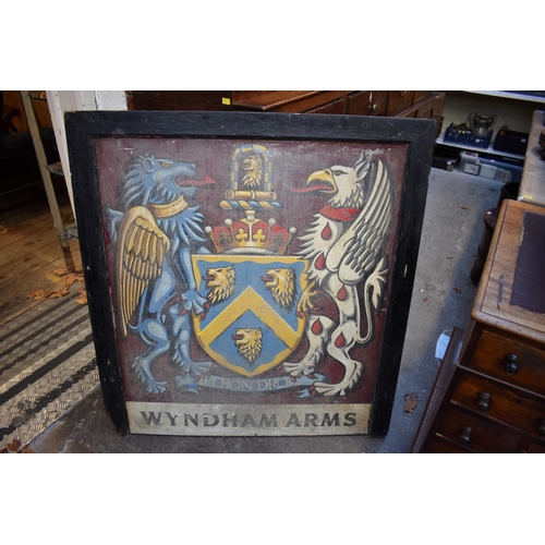 1240 - An old double sided 'Wyndham Arms' public house sign, 107 x 99cm. The Wyndham is located in Dinton, ... 