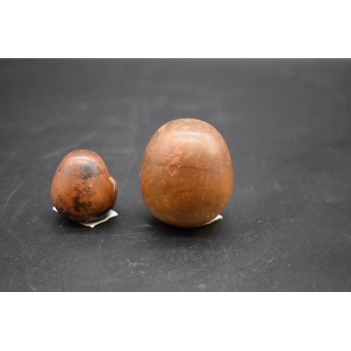 1288 - Two Japanese carved nut Kobe toys, Meiji, each depicting Daruma, largest 4.5cm. (2)  ... 