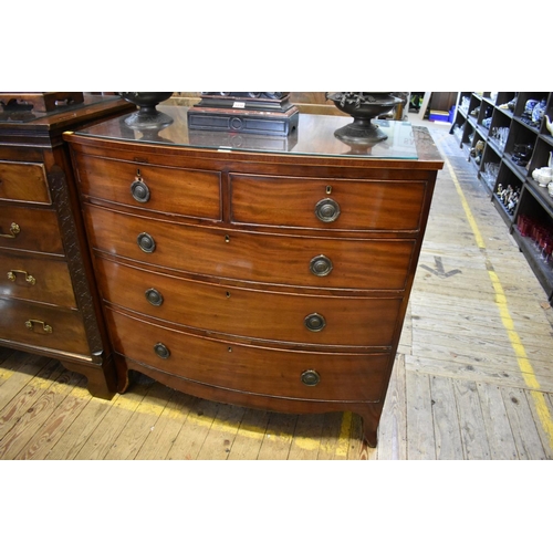 1437 - An early 19th century mahogany and line inlaid bowfront chest of drawers, 105cm wide. ... 