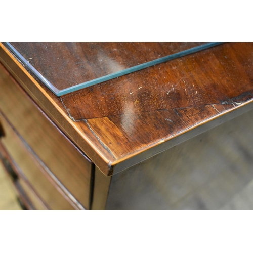 1437 - An early 19th century mahogany and line inlaid bowfront chest of drawers, 105cm wide. ... 