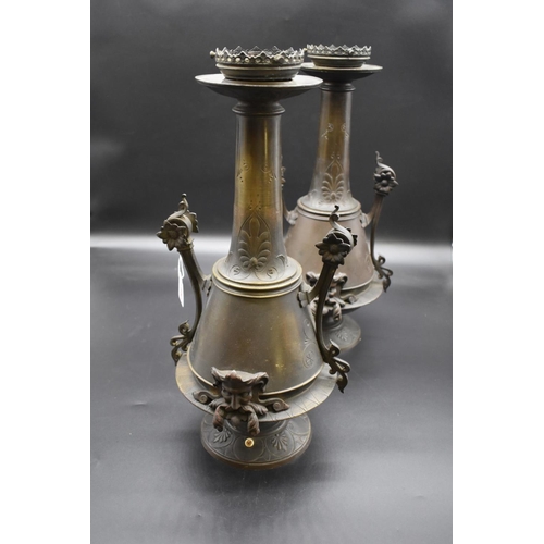 1440 - A large pair of French bronze twin handled table lamps, in the Aesthetic style, 48cm high. ... 