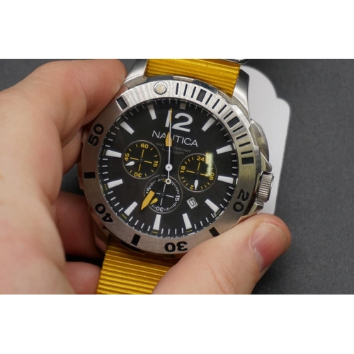 181 - A Nautica stainless steel quartz sports chronograph wristwatch, 50mm, Ref. A16566G, on yellow NATO s... 