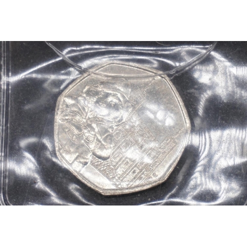 411 - Coins: Royal Mint, Paddington Bear 2018 collectable circulated fifty pence coins, comprising: thirty... 