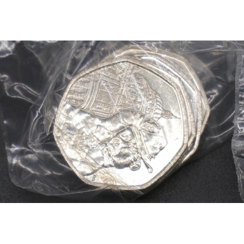 411 - Coins: Royal Mint, Paddington Bear 2018 collectable circulated fifty pence coins, comprising: thirty... 