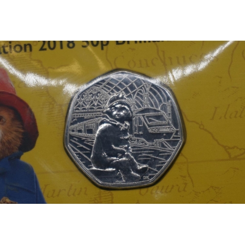 423 - Coins: Royal Mint, four 2019 Paddington Bear coin packs, sealed.