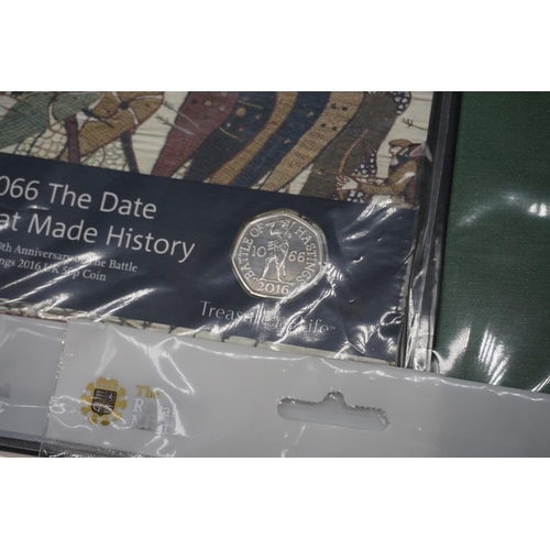 428 - Coins: Royal Mint, eleven collectable uncirculated fifty pence coin covers; to include: a 2019 Gruff... 