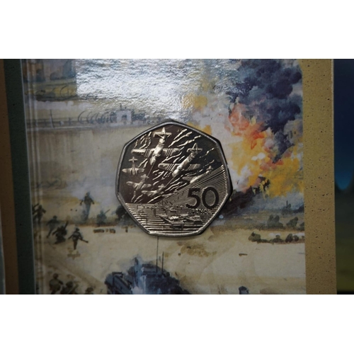 428 - Coins: Royal Mint, eleven collectable uncirculated fifty pence coin covers; to include: a 2019 Gruff... 