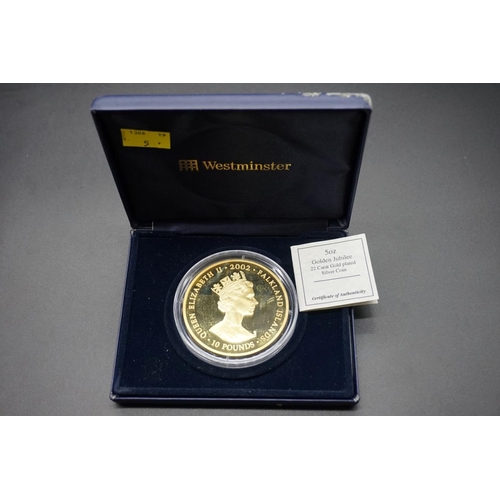 437 - Coins: a cased limited edition Westminster Collection Elizabeth II 2002 Falkland Islands gold plated... 