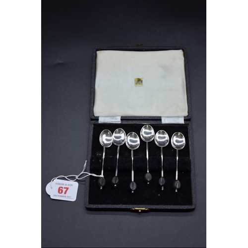 67 - A cased set of six silver bean handled coffee spoons, by S W Smith & Co, Birmingham 1914, g... 