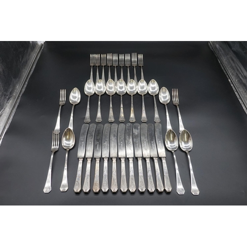 73 - A part set of German Secessionist silver plated cutlery, by H Kolbe, comprising; eleven table knives... 