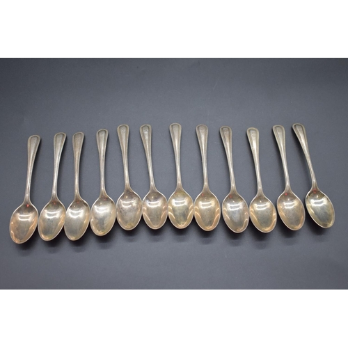 79 - A set of twelve Victorian silver Old English bead pattern teaspoons, by John Round & Son Lt... 