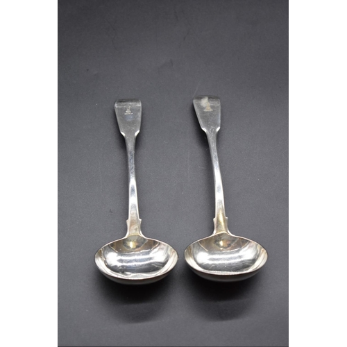 80 - A pair of George III silver fiddle pattern sauce ladles, by William Chawner II, London 181... 