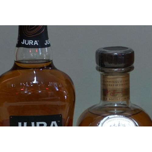 121 - Two 70cl bottles of single malt whisky, comprising: Jura 10 year old, in tube; and Cardhu 'Gold Rese... 