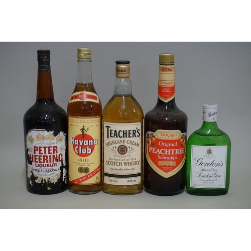 155 - A 70cl bottle of Teacher's blended whisky; together with a 75cl bottle of Havana Club; a 35cl bottle... 