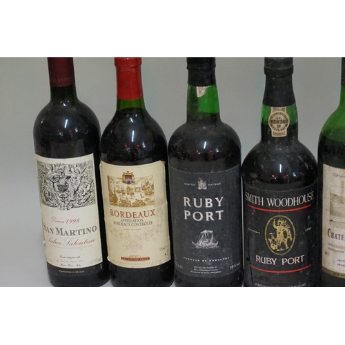 167 - A small collection of wine and port. (9)