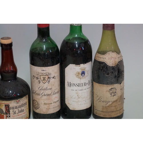 167 - A small collection of wine and port. (9)