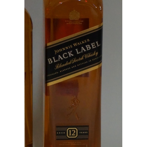 63 - Three 70cl bottles of blended whisky, comprising: Johnnie Walker 'Black label'; Immortal Memory; and... 