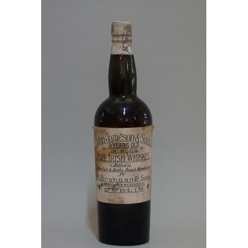 87 - A very rare old bottle of John Jameson &amp; Son's 9 Years Old in Wood Pure Irish whiskey, bottled a...
