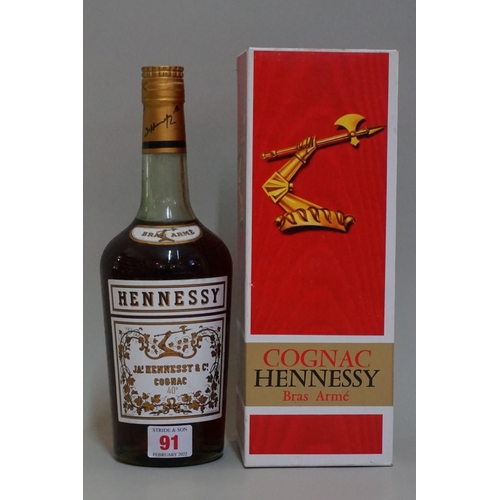 91 - A bottle of Hennessy 'Bras Arme' cognac, probably 1960s bottling, in card box.