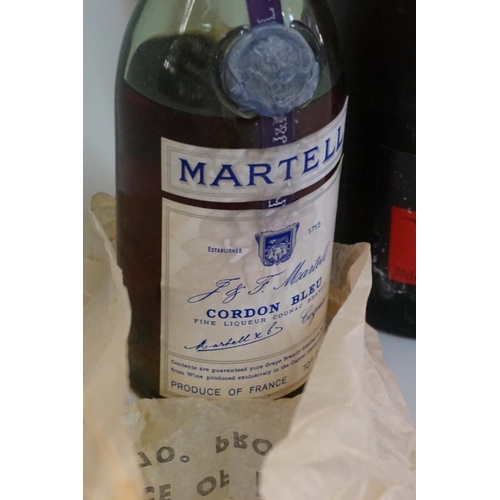 95 - A 70cl bottle of Remy Martin VSOP fine champagne cognac; together with a half bottle of Martell 'Cor... 