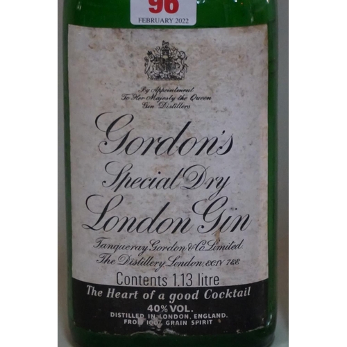 96 - An old 1.13 litre bottle of Gordon's London dry gin; together with another 1 litre bottle of Gordon'... 