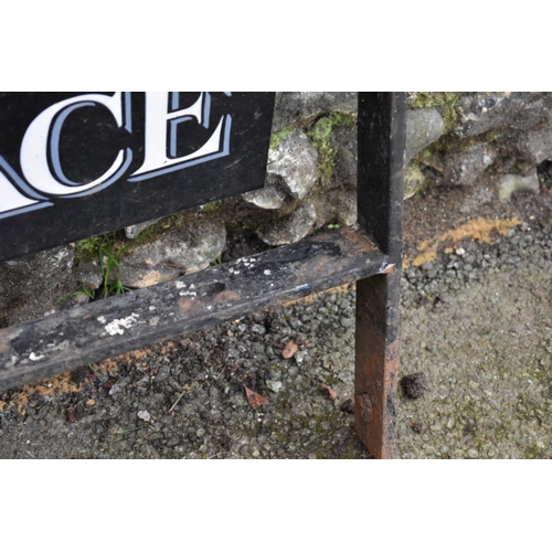 1049 - A wrought iron and enamel sign, 'Palmers Place', 124cm long.