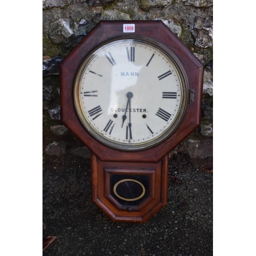 1059 - A 19th century American rosewood drop dial wall clock, the 11.5in painted dial inscribed 'Mann, Glou... 