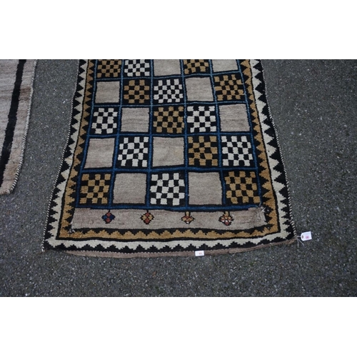 1063 - A Persian Gabbeh runner, 330cm x 110cm; together with a Gabbeh long rug, 232cm x 130cm.... 