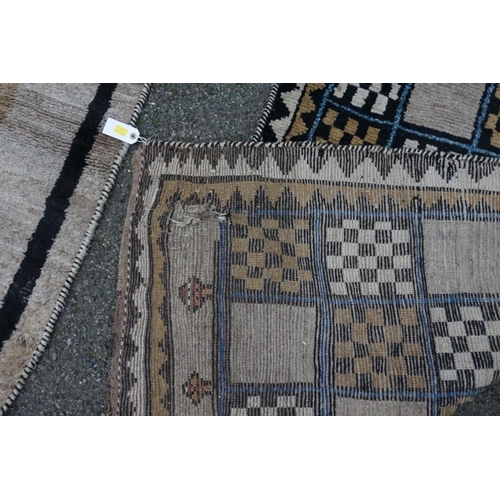 1063 - A Persian Gabbeh runner, 330cm x 110cm; together with a Gabbeh long rug, 232cm x 130cm.... 