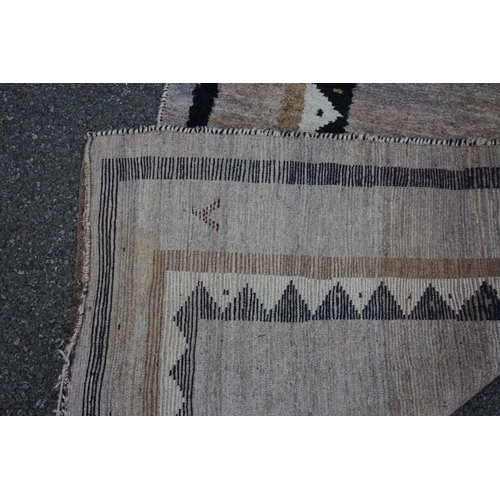 1063 - A Persian Gabbeh runner, 330cm x 110cm; together with a Gabbeh long rug, 232cm x 130cm.... 