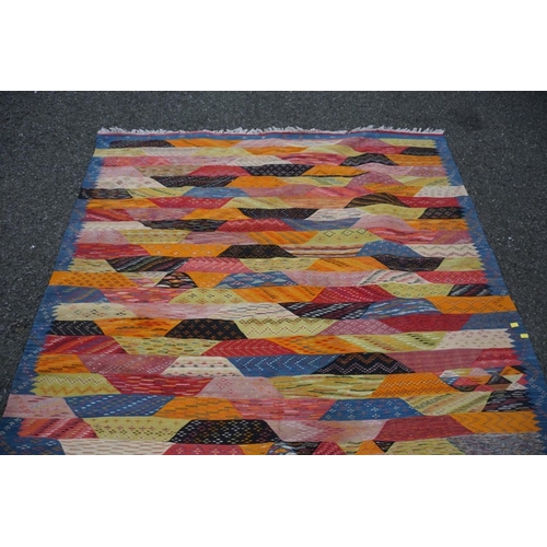 1066 - A Persian Shiraz flatweave rug, 298cm x 197cm.