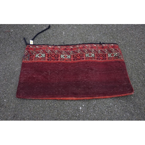 1068 - A Persian camel bag, 123cm x 66cm high.