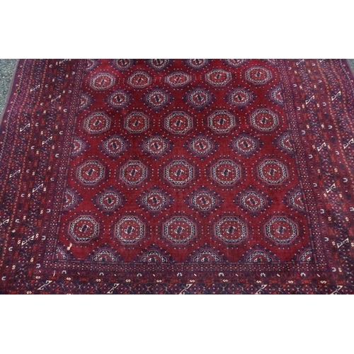 1069 - A Bokhara carpet, having repeated central field with geometric borders, 280cm x 208cm.... 