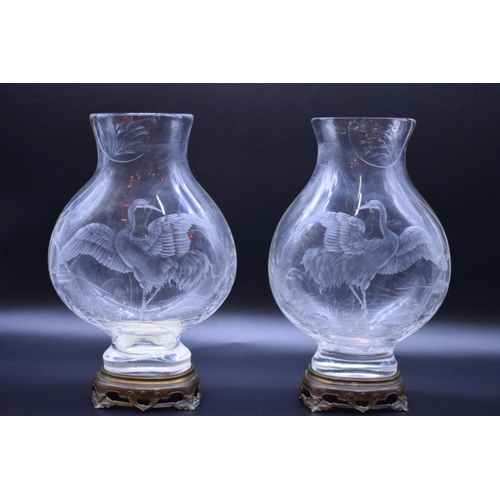 1412 - A good pair of late 19th century Baccarat rock crystal style cut glass vases, each finely engraved w... 