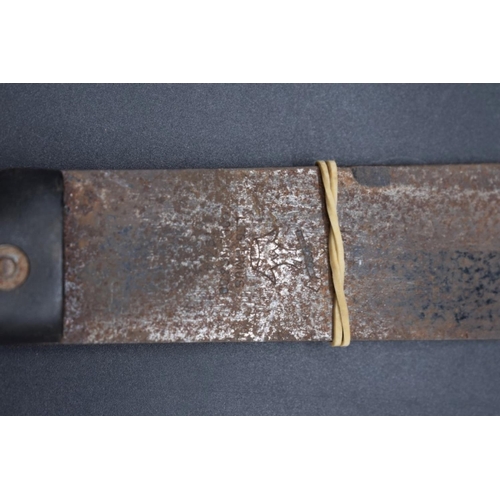 1713 - An Indian Tulwar and leather scabbard, with 74cm curved blade; together with a machete; a commando k... 