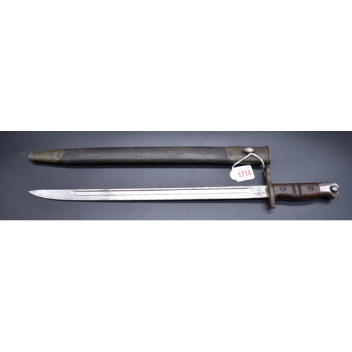 1714 - A US bayonet and steel scabbard, the blade dated 1913.